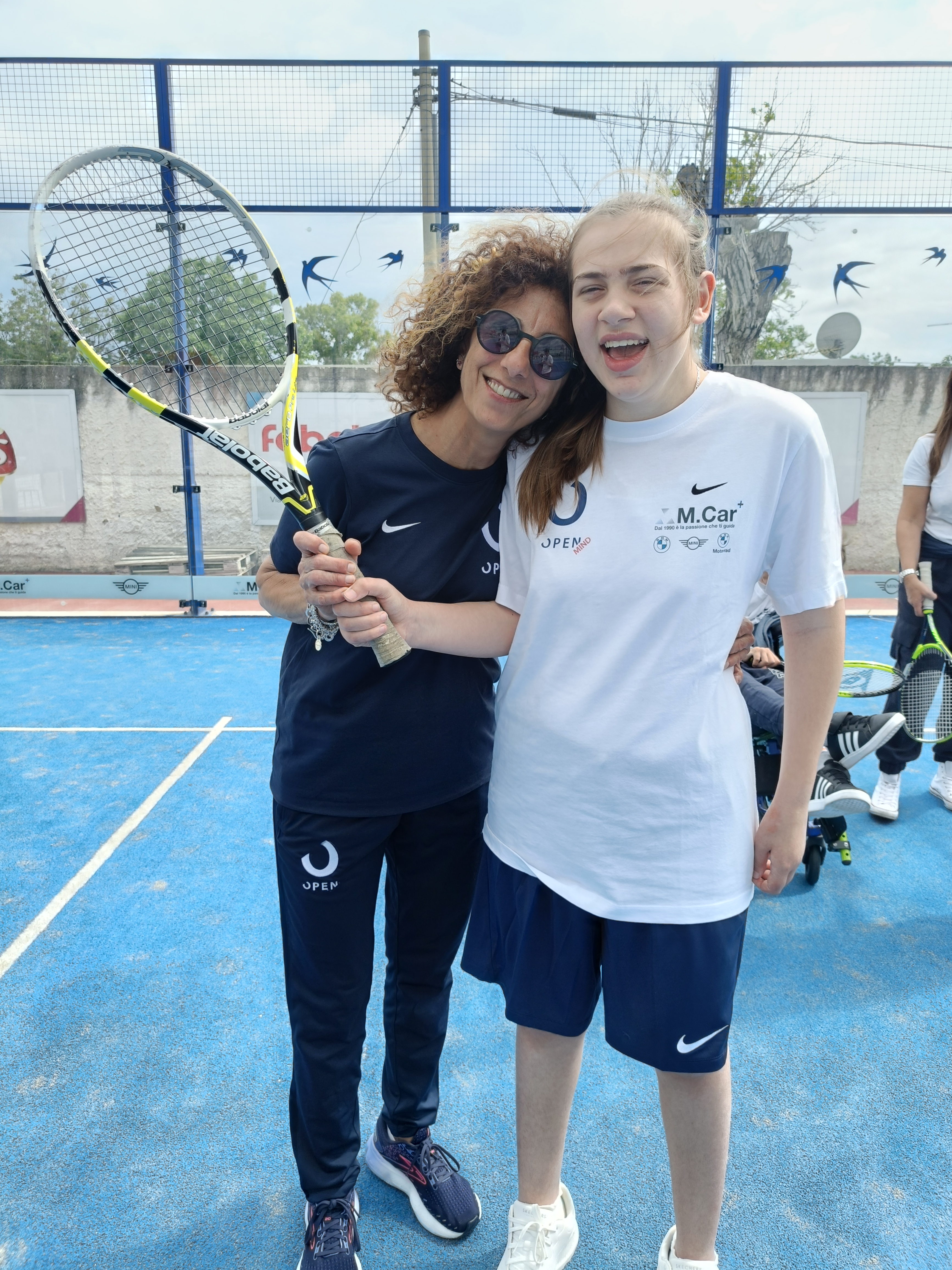 Coach e atleta sul campo